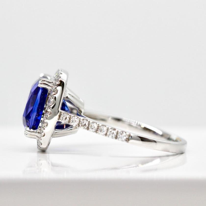 18ct White Gold Tanzanite and Diamond Halo Ring