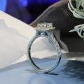 Platinum and Emerald Cut Diamond Halo Ring
