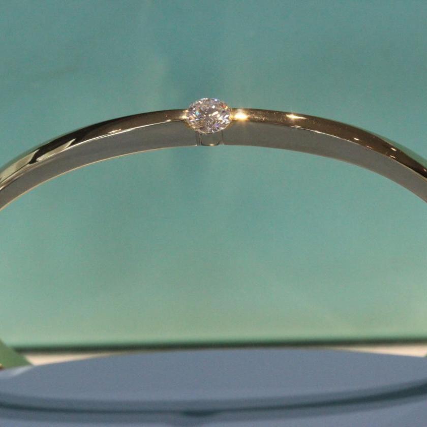 The Petite Solitaire Diamond Bangle