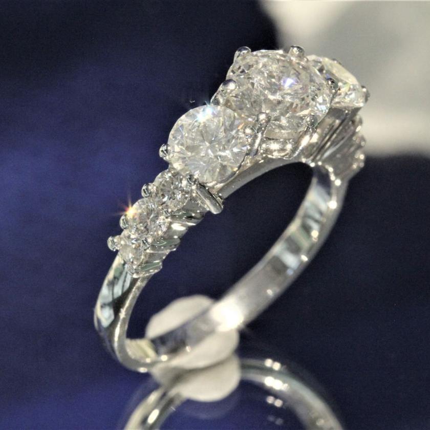 The Round Diamond Trilogy Engagement Ring