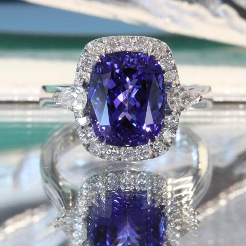 18ct White Gold Tanzanite and Diamond Halo Ring