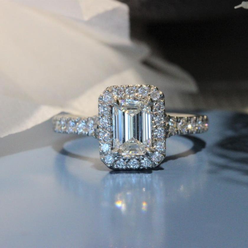 Platinum and Emerald Cut Diamond Halo Ring