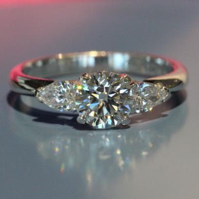 The Round and Pear Three Stone Engagement Ring
