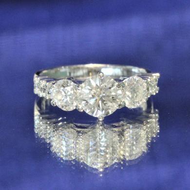 The Round Diamond Trilogy Engagement Ring