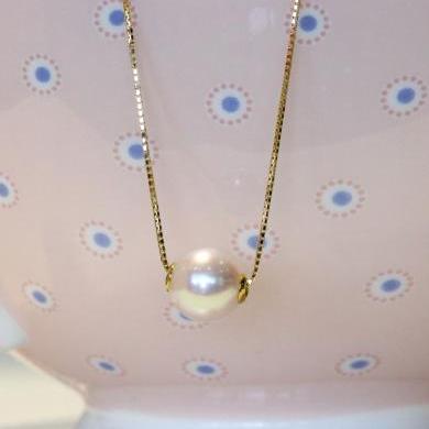 The  Solitaire Akoya Pearl Pendant.